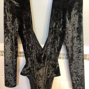 Womens black long sleeved body suit NEW